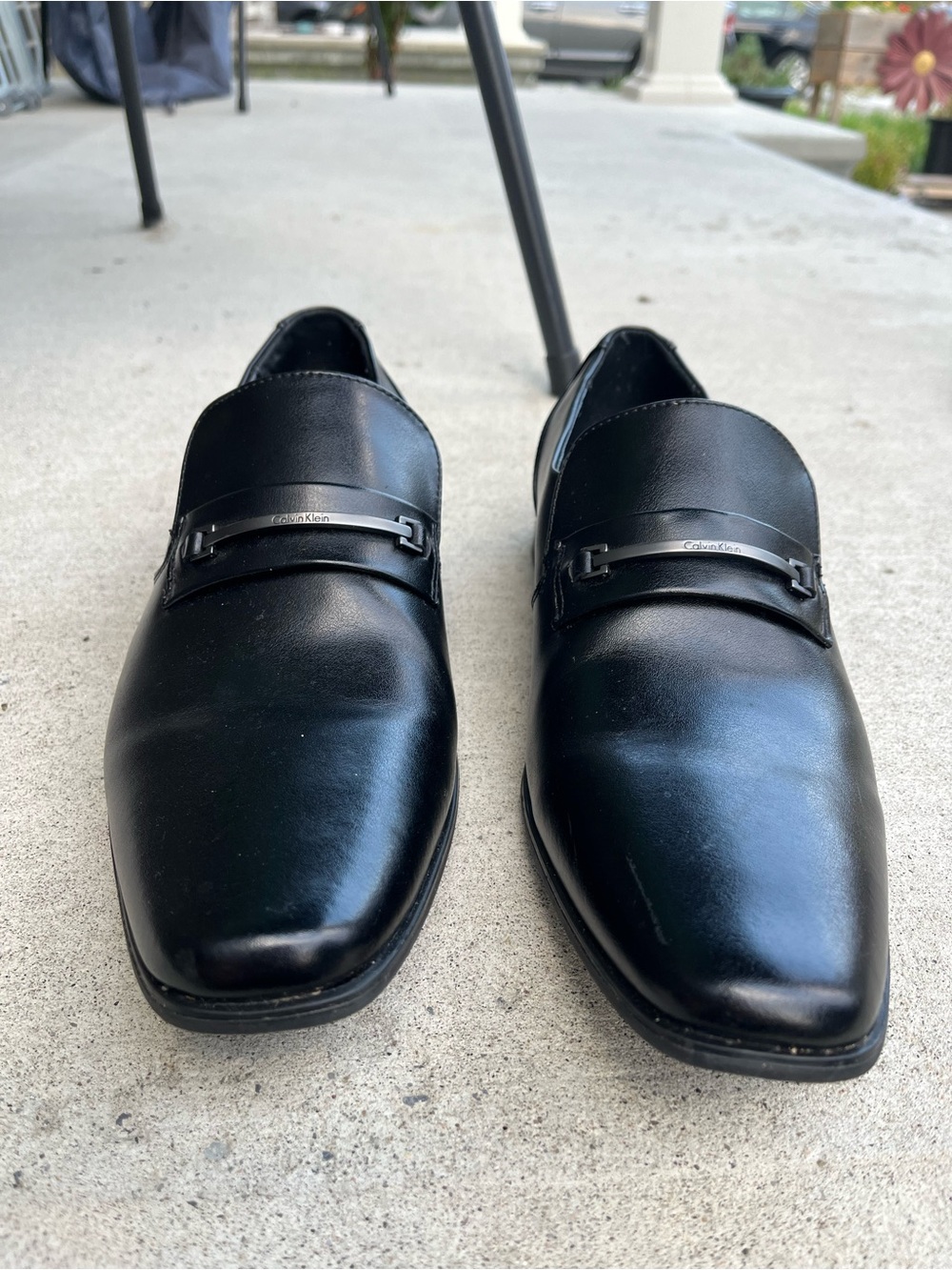 Calvin Klein Men’s Black Leather Slip-On Loafers with Metal Bit